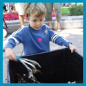 Subject: EnAct Composting Demonstration; Location: Dane County Farmer's Market, Madison, WI; Date: August 2004; Photographer: Sonya Newenhouse