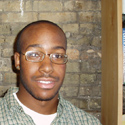 Subject: Pascal Enemouh; Location: Madison Environmental Group Office, Madison, WI; Date: July 2004; Photographer: Sonya Newenhouse